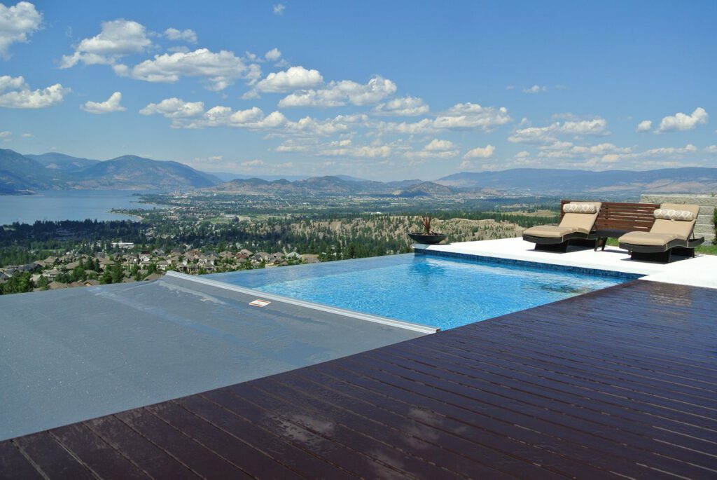 Pool Patrol pool with a view over Okanagan Lake and Kelowna