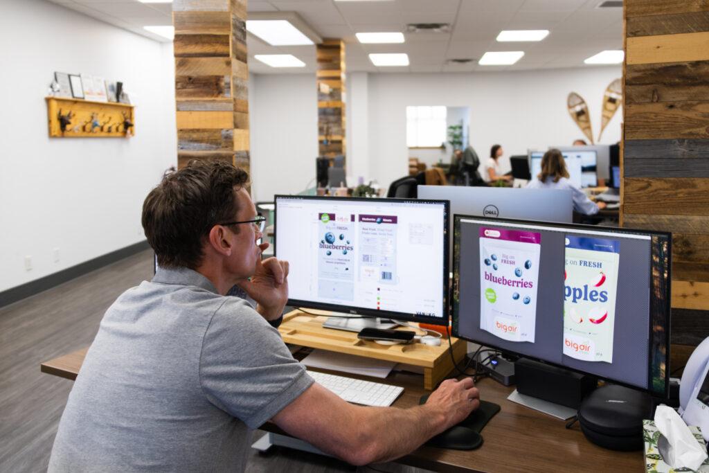 Designers at work with more than one screen
