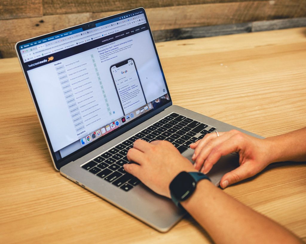 Managing a Google Ads campaign on a laptop