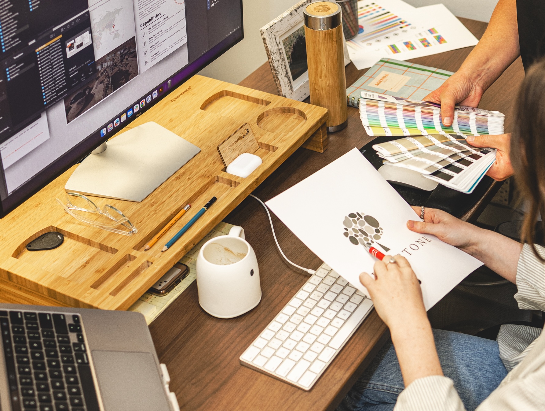 A brand identity being shaped from logo to colours and icons
