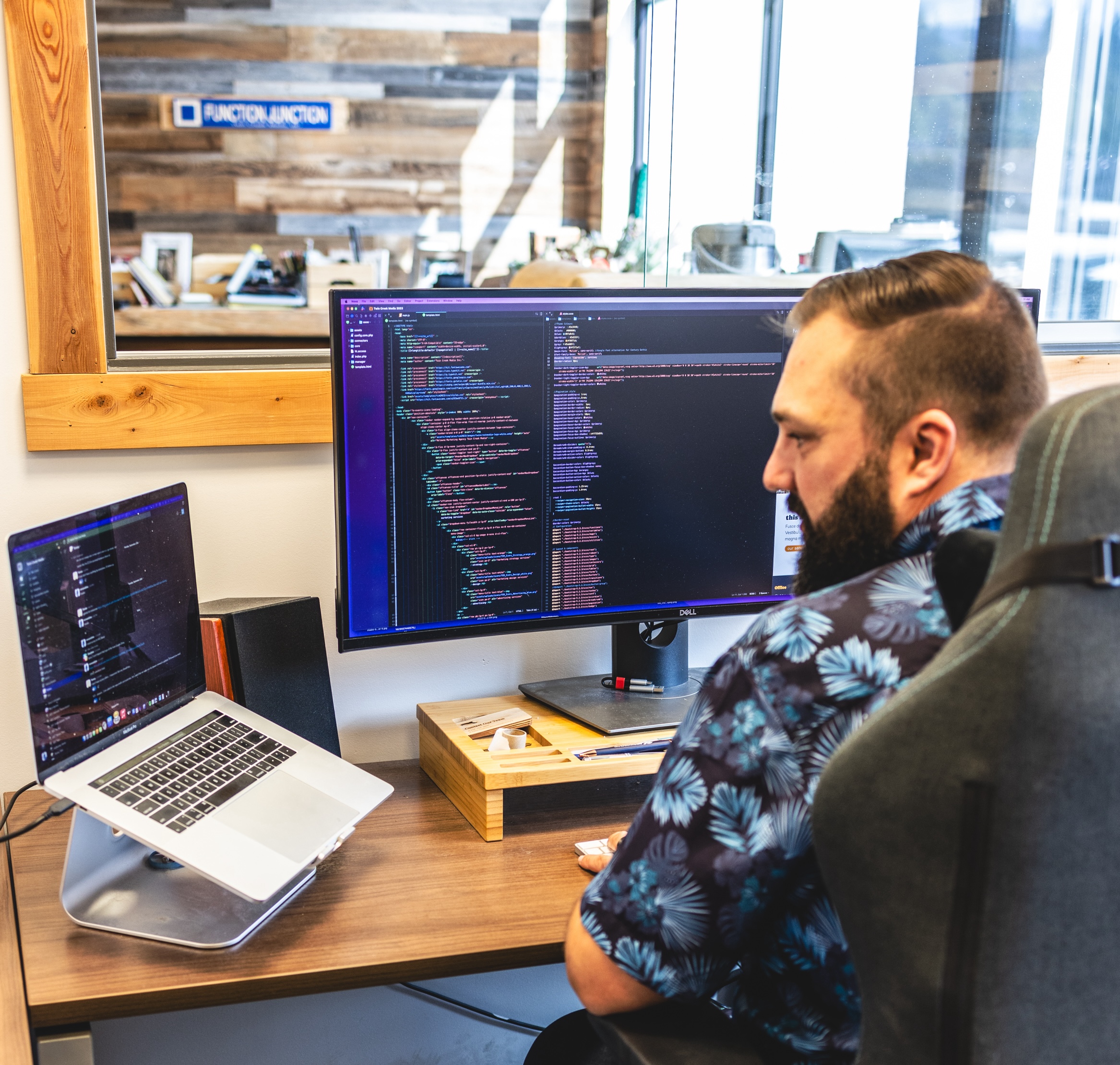 A designer and a developer collaborating on a website